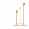 gold-iron-taper-candle-holder-in-set-3-for-home-decor- gold iron taper candle holder set of 3 mixed height modern candlestick for home wedding table decor