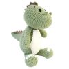 Handmade green cotton crochet dinosaur amigurumi plush toy with embroidered face, baby safe stuffed animal for nursery and kids gift